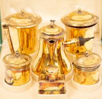 A French Silver-Gilt Six-Piece Chocolate Service
