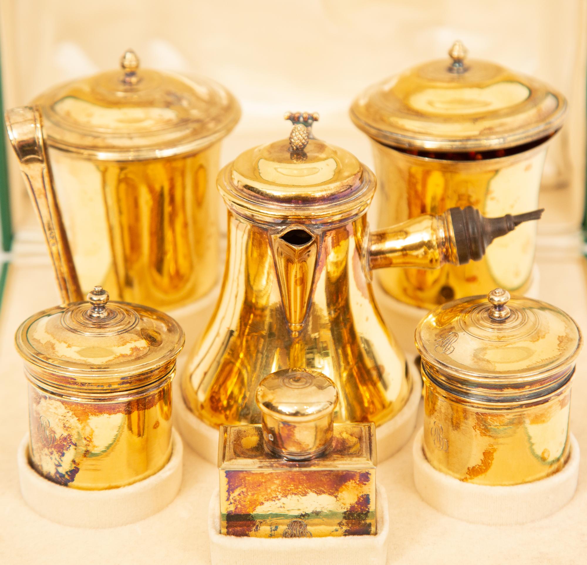 A French Silver-Gilt Six-Piece Chocolate Service
