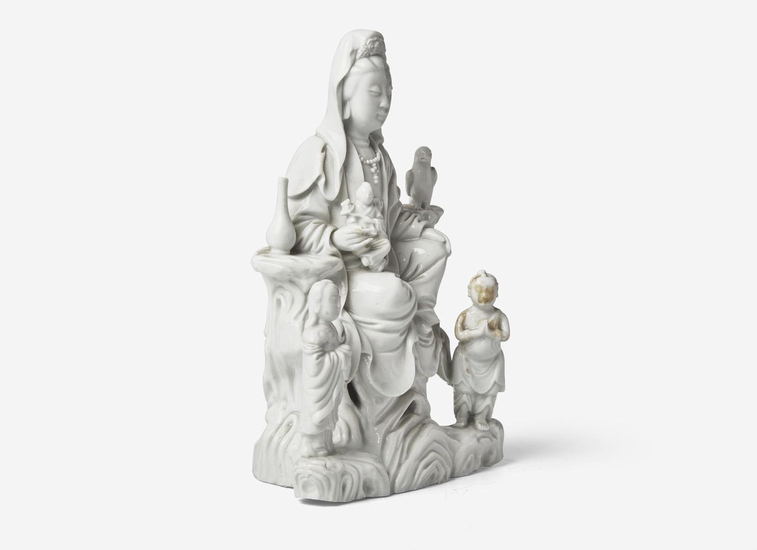 A Chinese Blanc-de-Chine Porcelain Figural Group of Guanyin and Attendants