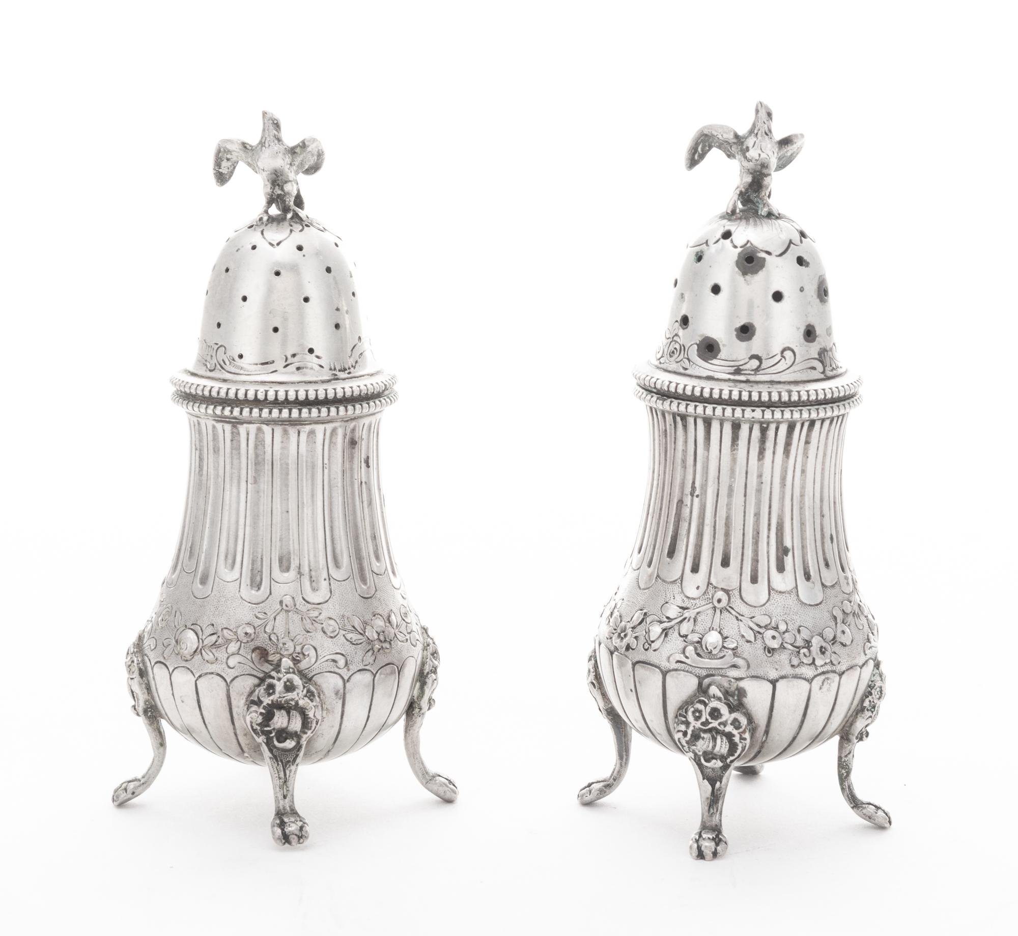 Two German Silver Casters Height 5 inches. — STORK AND SINSHEIMER, LATE 19TH/EARLY 20TH CENTURY.