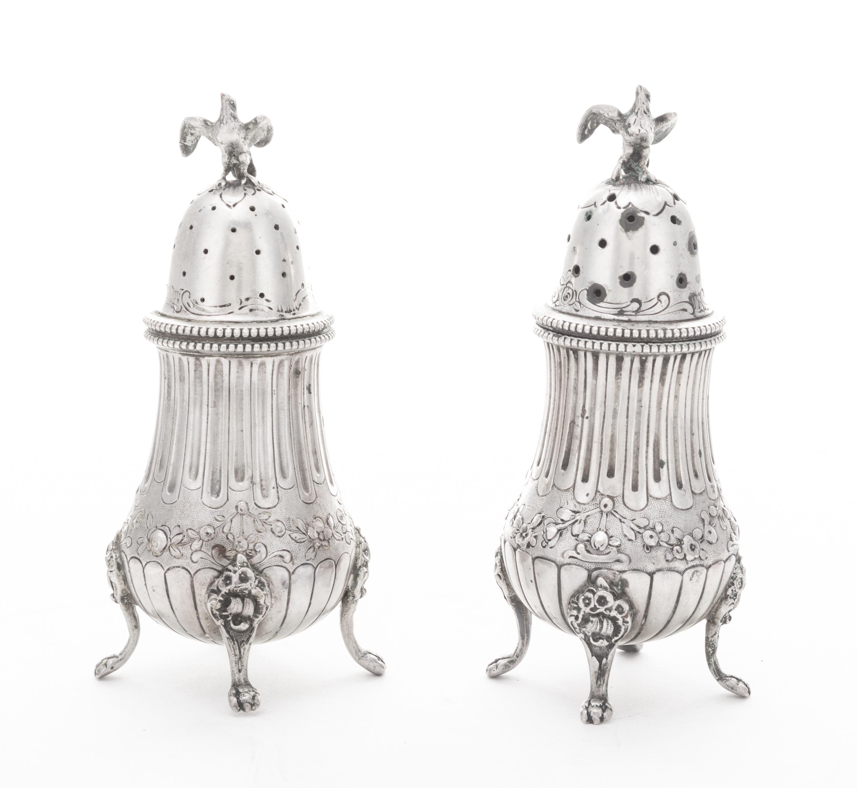 Two German Silver Casters Height 5 inches. — STORK AND SINSHEIMER, LATE 19TH/EARLY 20TH CENTURY.