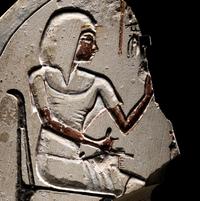 An Egyptian Painted Limestone Stele of Simut, Second Prophet of Amun