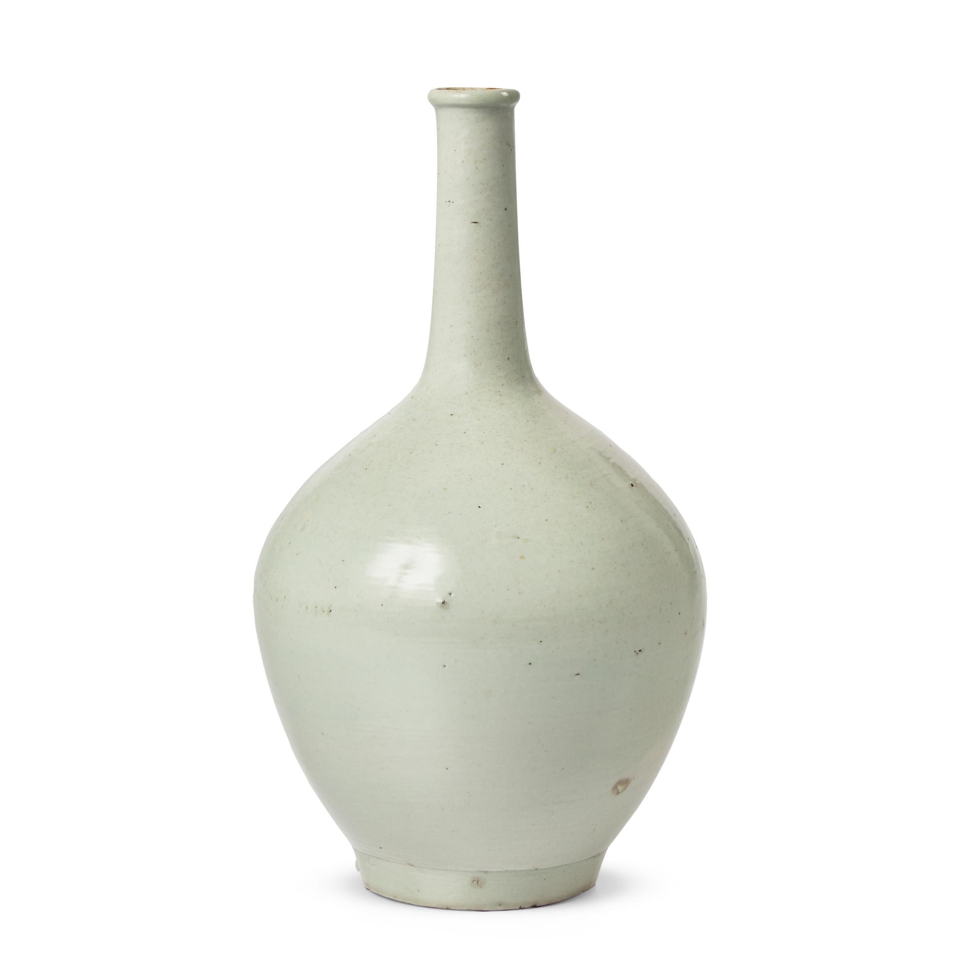 A Korean White Glazed Porcelain Tall-Neck Bottle Vase, Joseon Dynasty, 18th Century