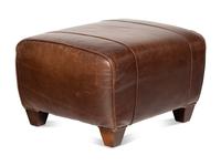 A Contemporary Leather-Upholstered Lounge Chair and Ottoman