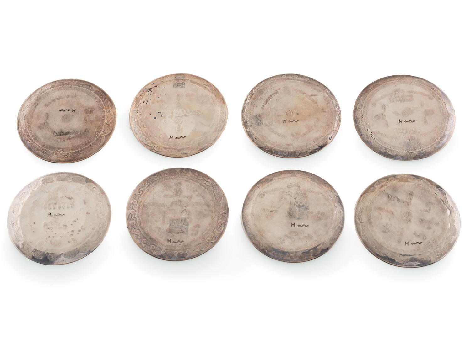 Group of Heavily Stamped Silver Coasters
