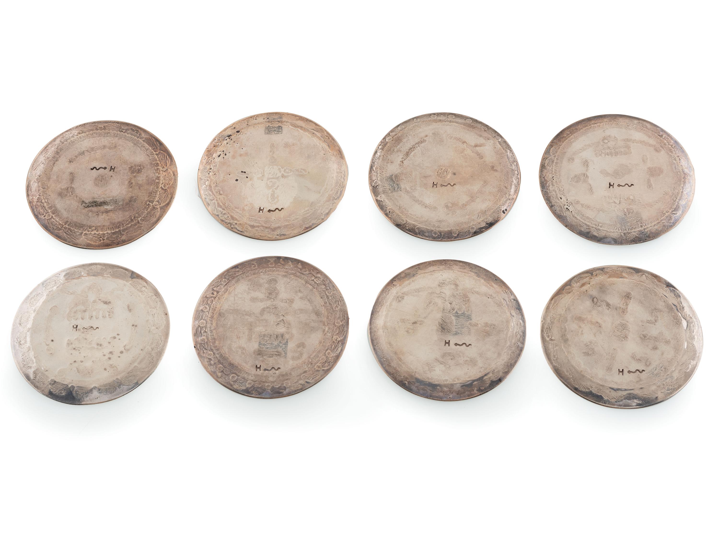 Group of Heavily Stamped Silver Coasters