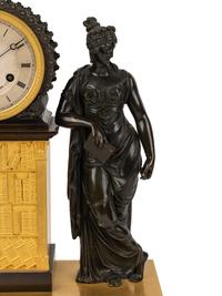 A French Gilt and Patinated Bronze Figural Mantel Clock