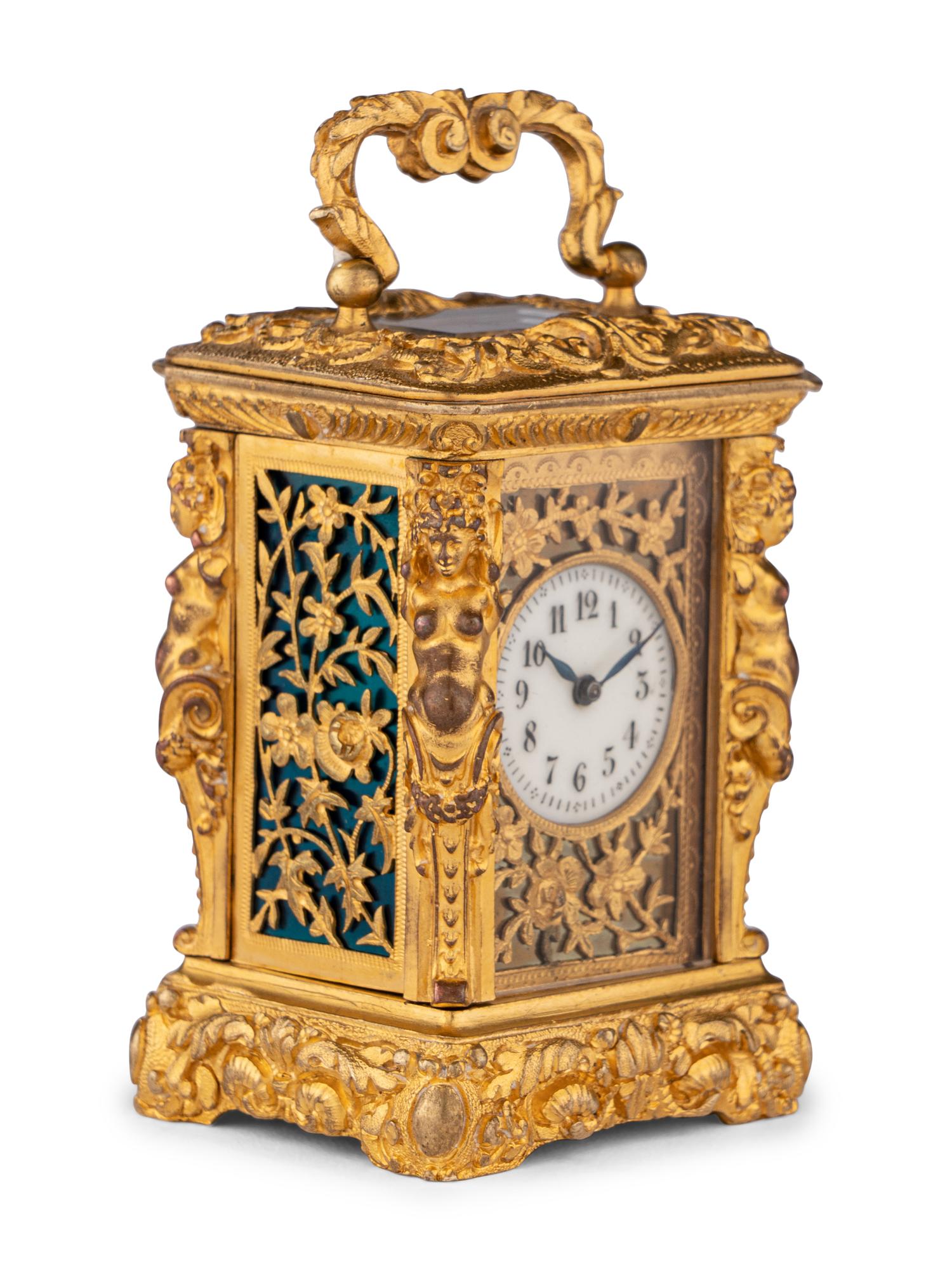A French Miniature Gilt Bronze Eight-Day Carriage Clock