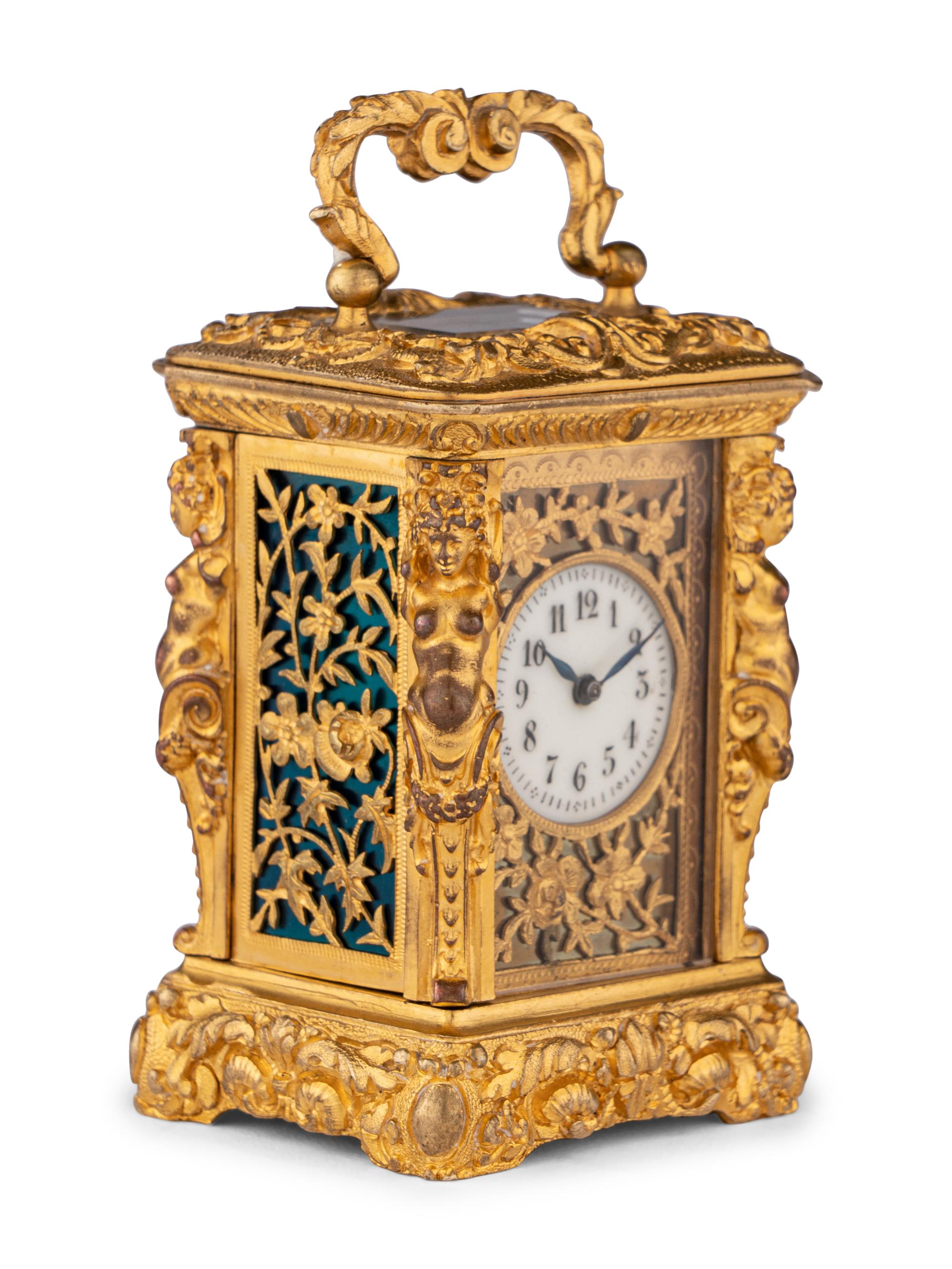 A French Miniature Gilt Bronze Eight-Day Carriage Clock