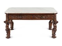 A Renaissance Style Carved Oak Marble-Top Low Table