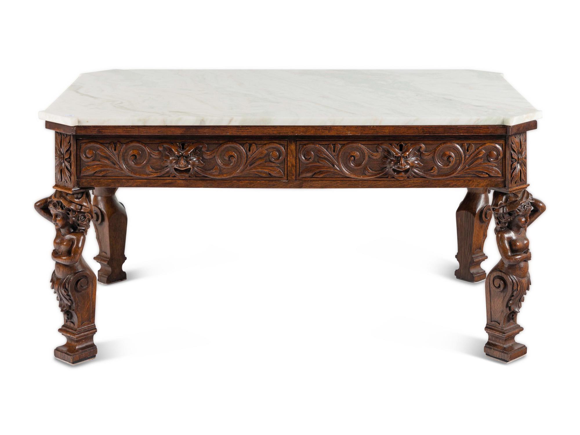 A Renaissance Style Carved Oak Marble-Top Low Table