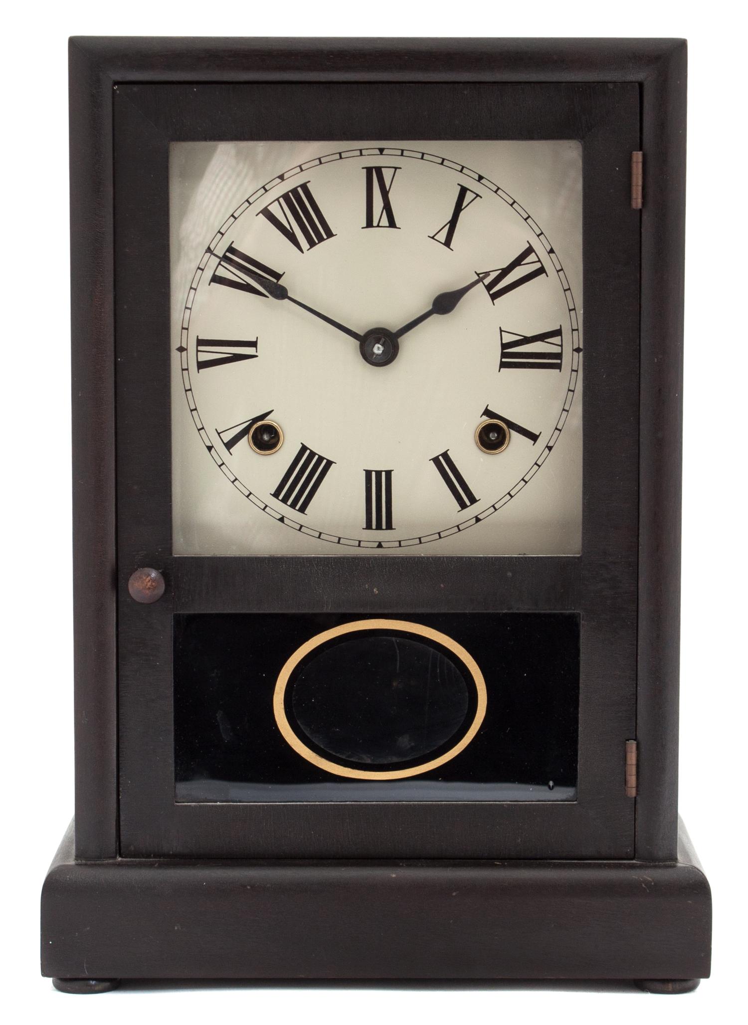 An American Ebonized Shelf Clock Height 12 3/4 inches. — 19TH CENTURY