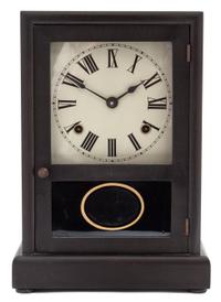 An American Ebonized Shelf Clock Height 12 3/4 inches. — 19TH CENTURY