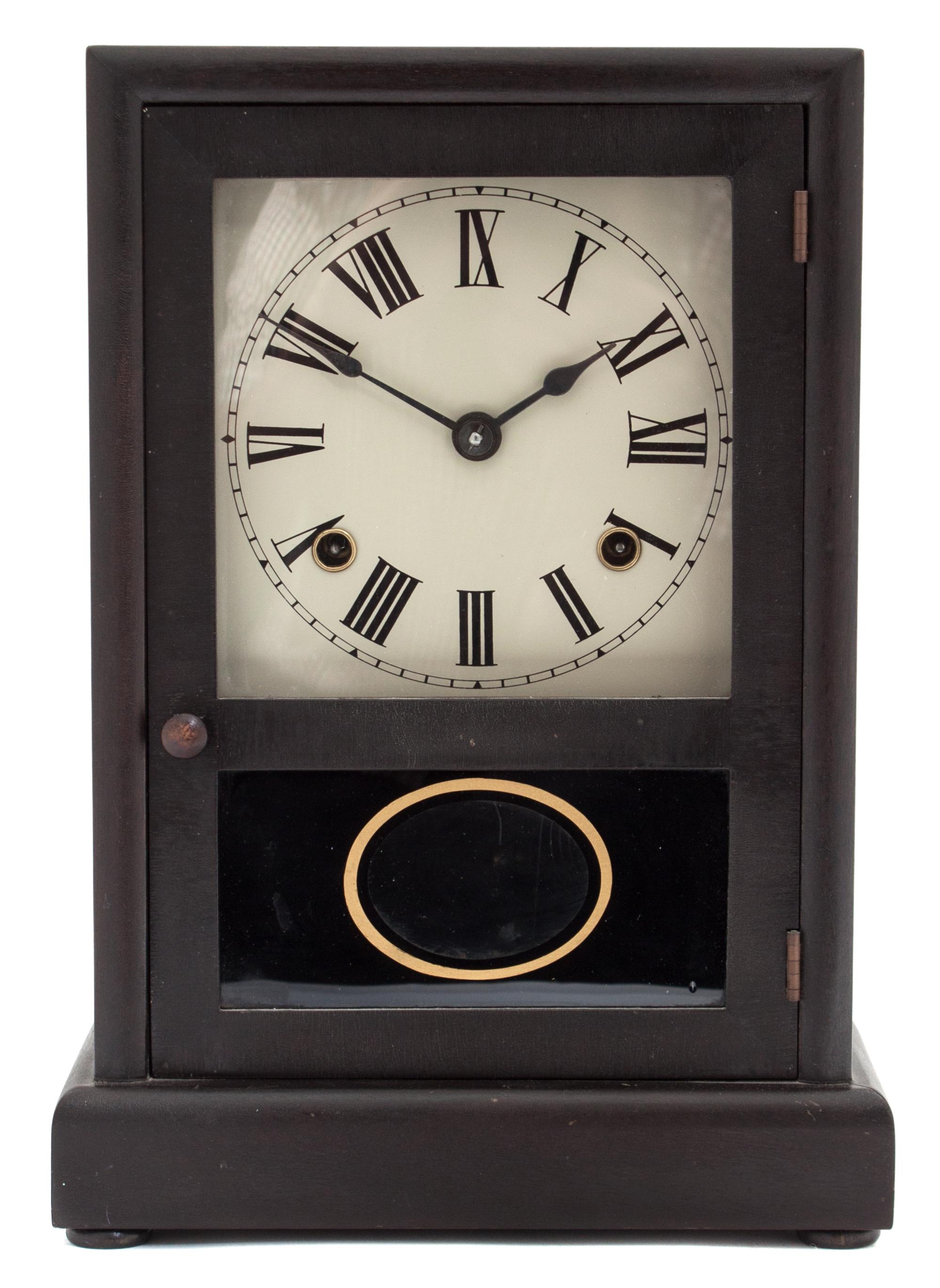 An American Ebonized Shelf Clock Height 12 3/4 inches. — 19TH CENTURY