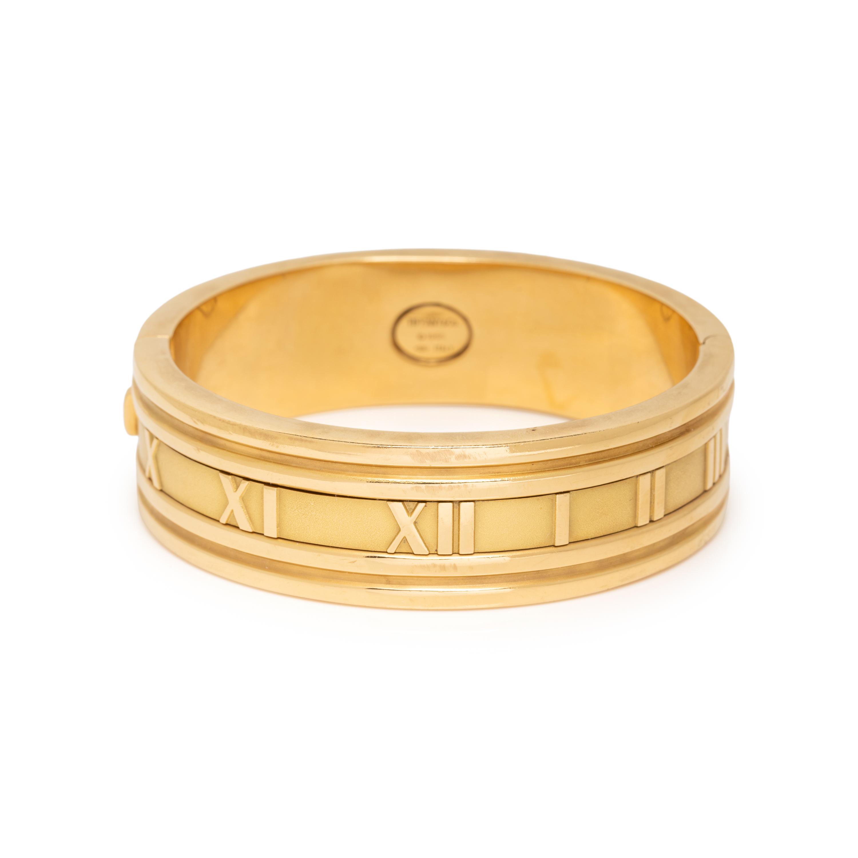 TIFFANY & CO., YELLOW GOLD 'ATLAS' HINGED BANGLE BRACELET