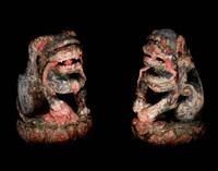A Pair of Chinese Polychrome Painted Wood Figures of Fu Lions