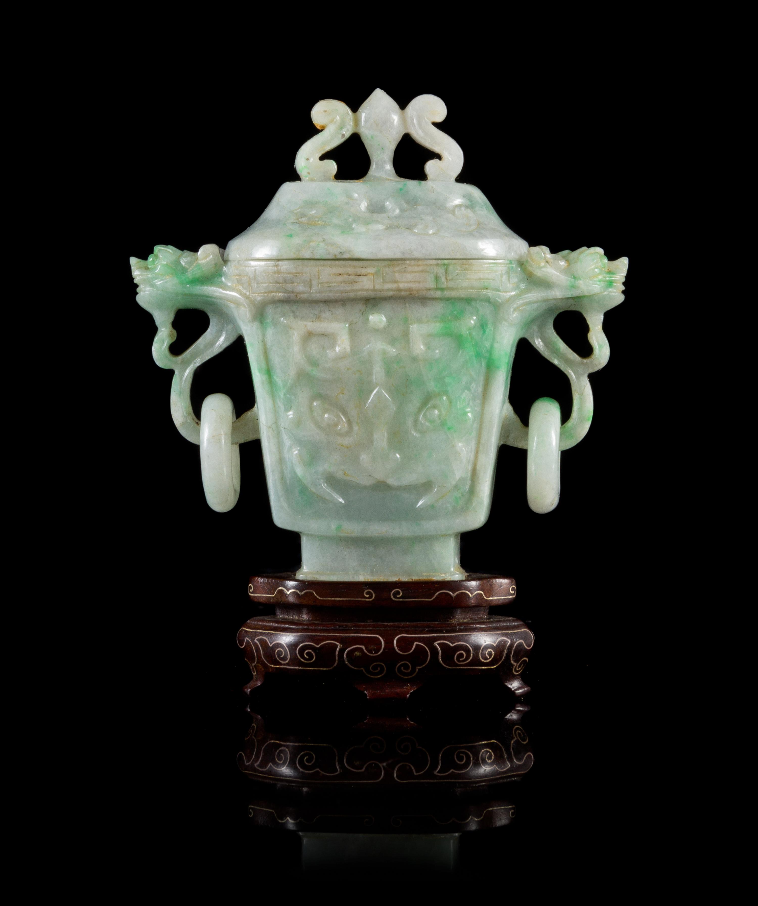 An Apple Green and Celadon Jadeite Covered Vase Height 3 inches.