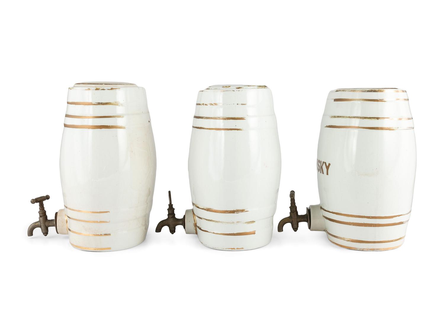 Three English Parcel-Gilt Porcelain Counter Top Liquor Dispensers