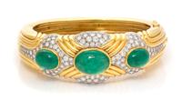 An 18 Karat Yellow Gold, Platinum, Emerald and Diamond Bangle Bracelet, Montreaux, 57.55 dwts.