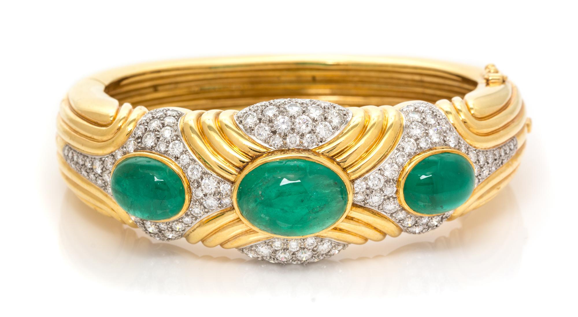 An 18 Karat Yellow Gold, Platinum, Emerald and Diamond Bangle Bracelet, Montreaux, 57.55 dwts.