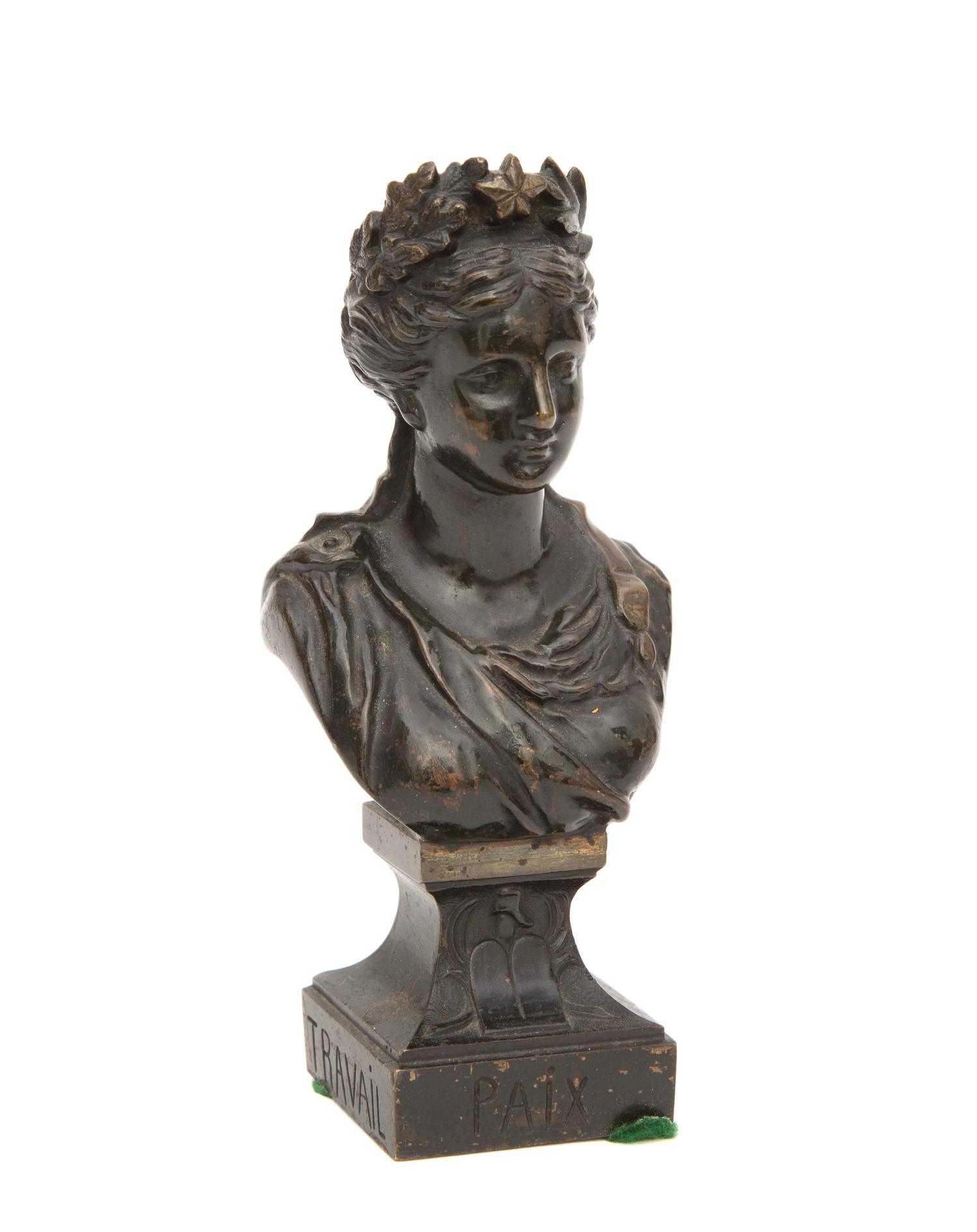 A Small Bronze Bust Height 6 inches.