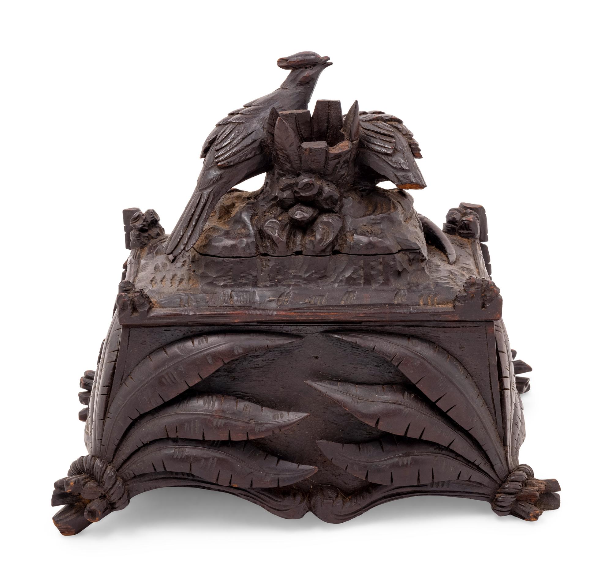 A Black Forest Carved Table Casket