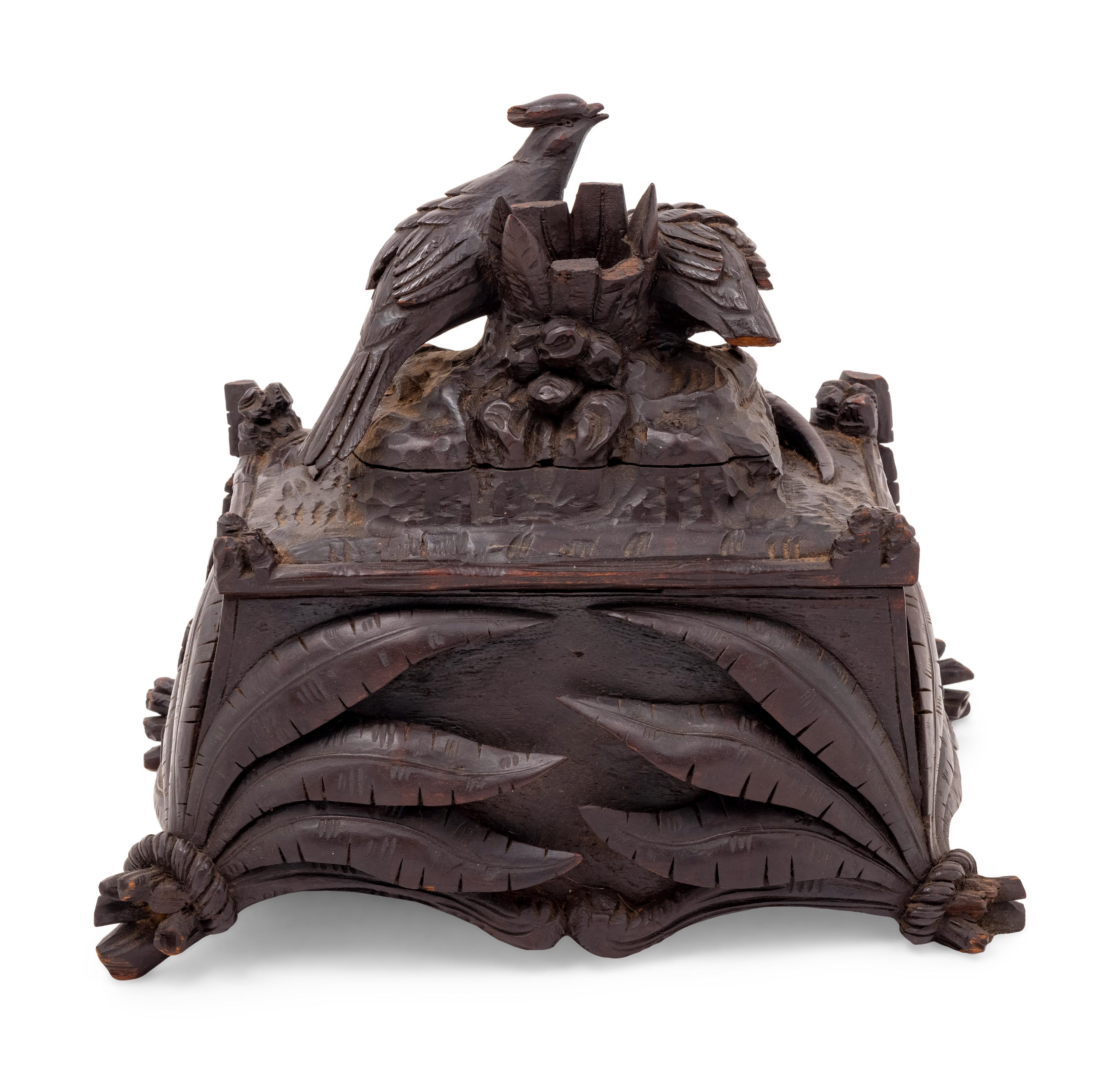 A Black Forest Carved Table Casket