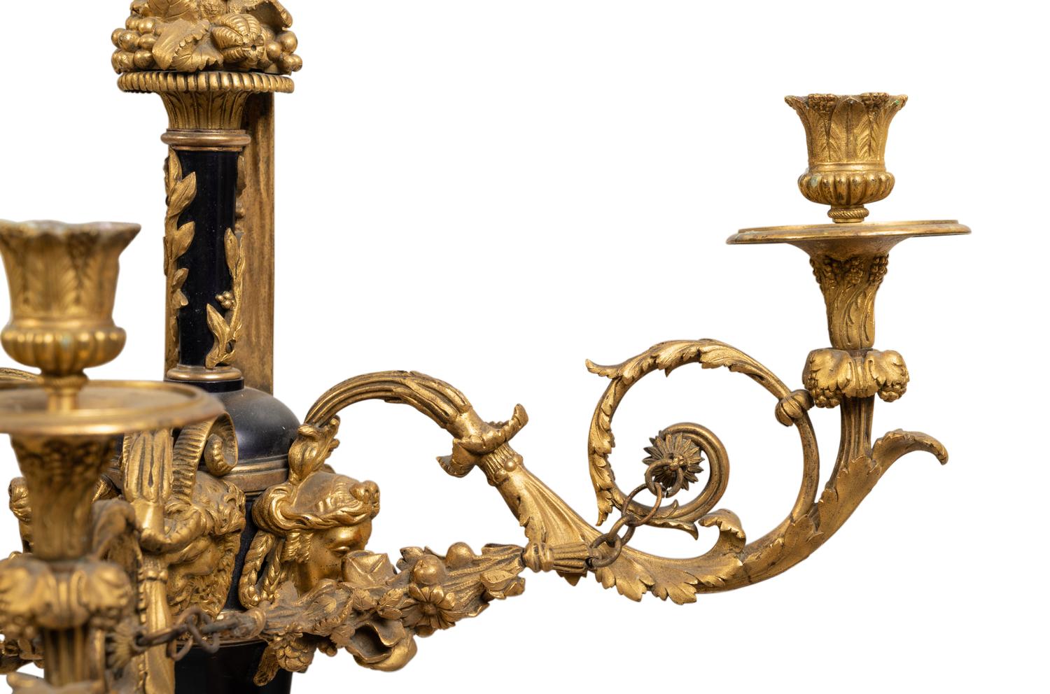 A Pair of Louis XVI Style Gilt Bronze Three-Light Wall Sconces