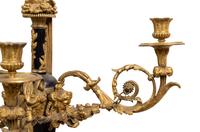 A Pair of Louis XVI Style Gilt Bronze Three-Light Wall Sconces