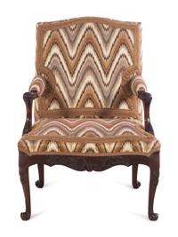A Régence Style Carved Walnut Fauteuil