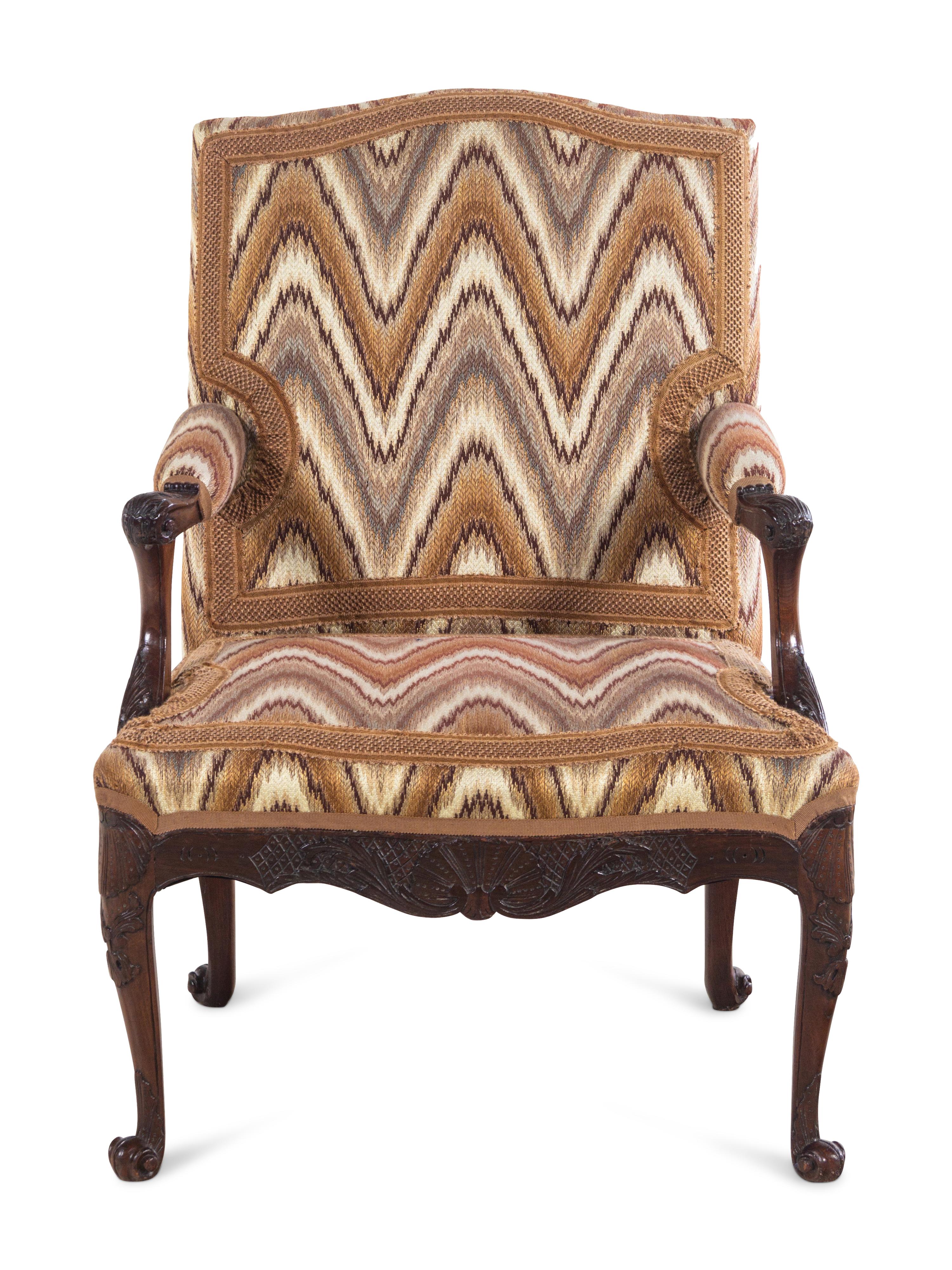 A Régence Style Carved Walnut Fauteuil