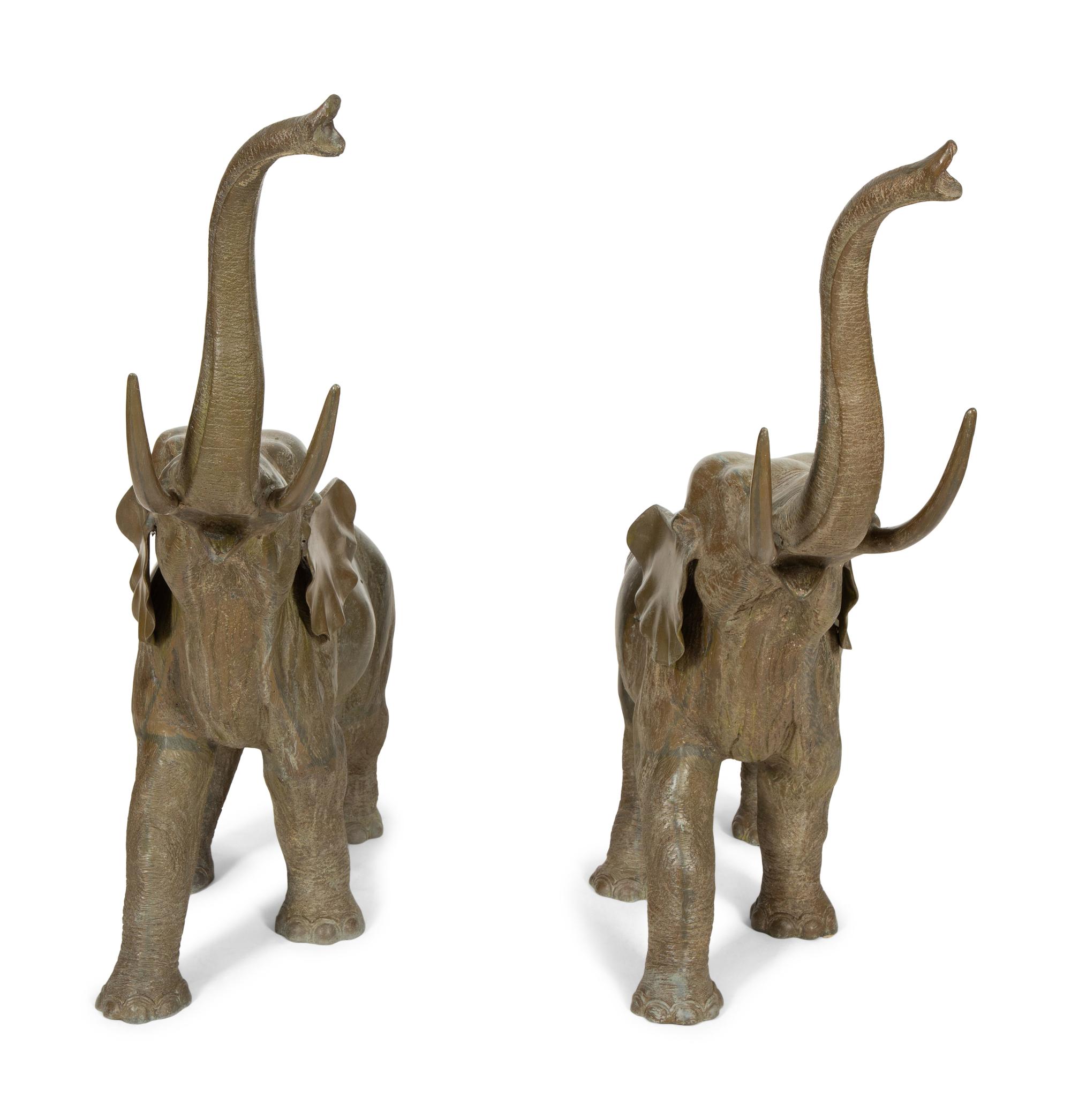 A Pair of Patinated Bronze Elephants