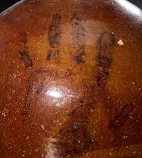 Two Brown Glazed Stoneware Vessels