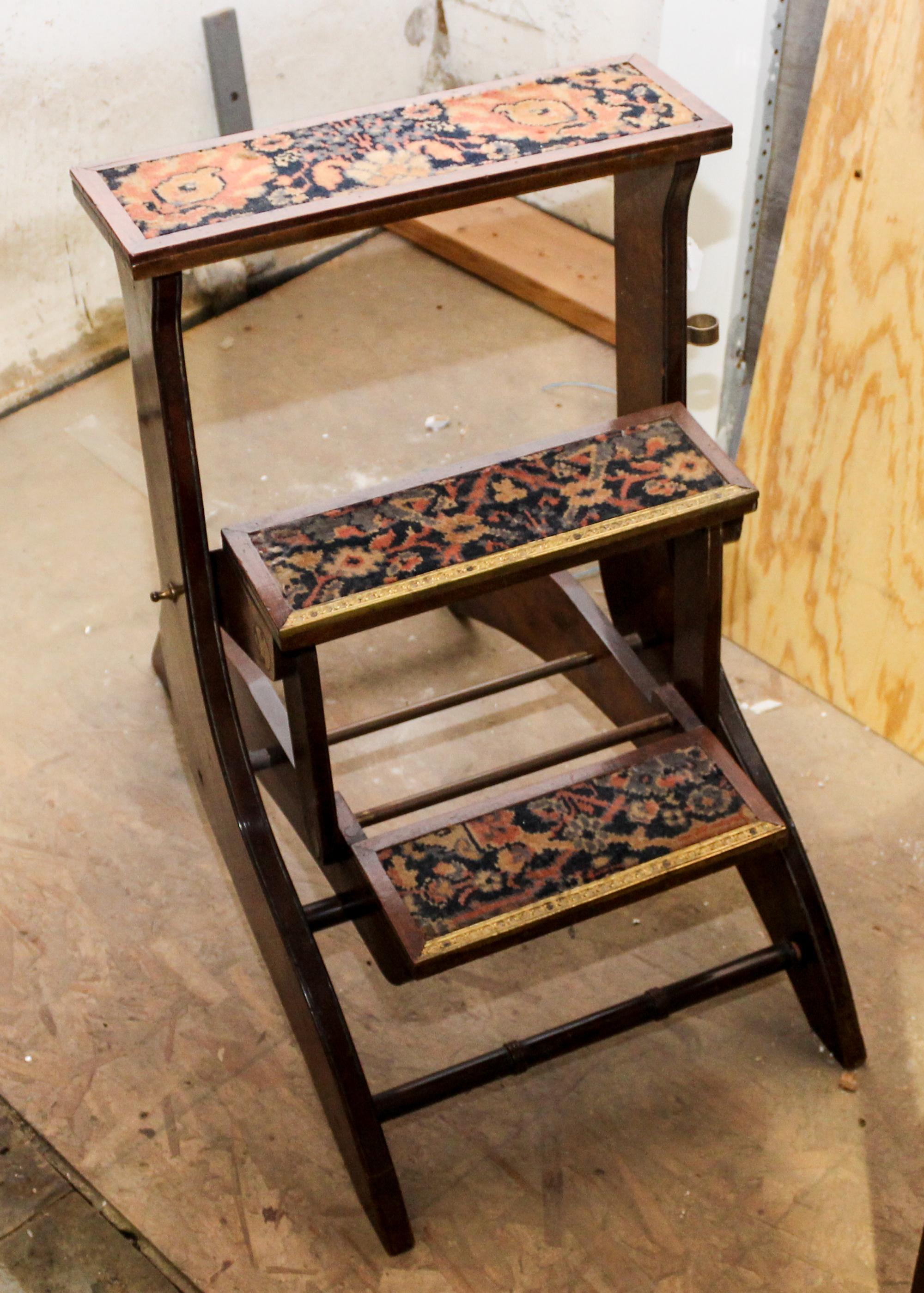 A Set of Regency Style Mahogany Folding Library Steps Height of tallest step 27 1/4 inches.