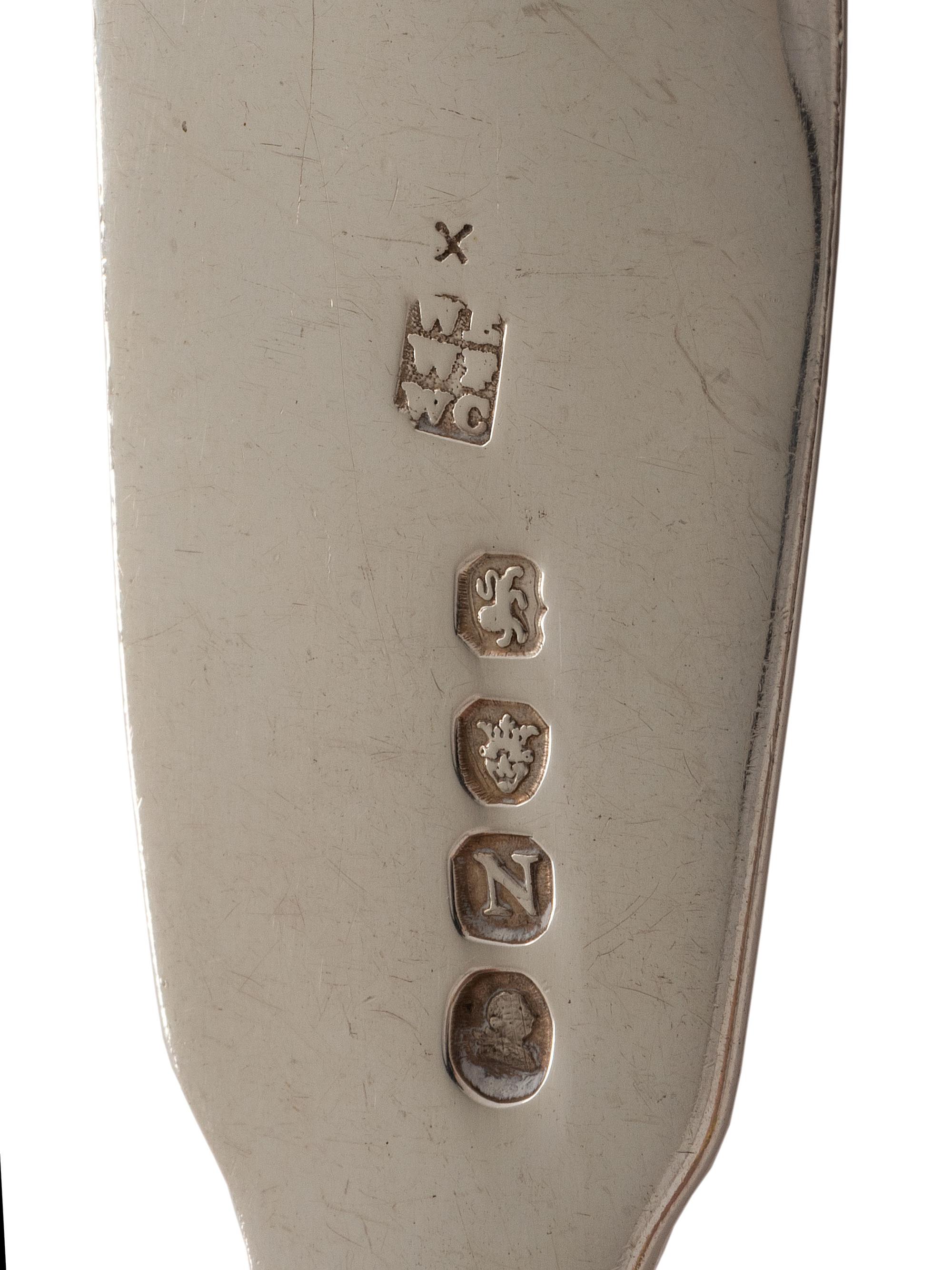 An English Silver Cranberry Spoon, Sauce Ladle and Slotted Ladle