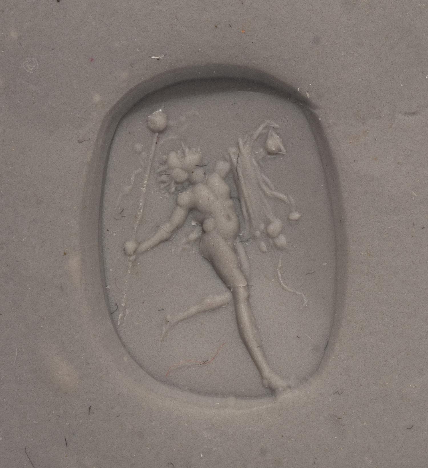 A Roman Carnelian Intaglio with a Dancing Satyr