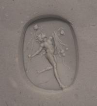 A Roman Carnelian Intaglio with a Dancing Satyr