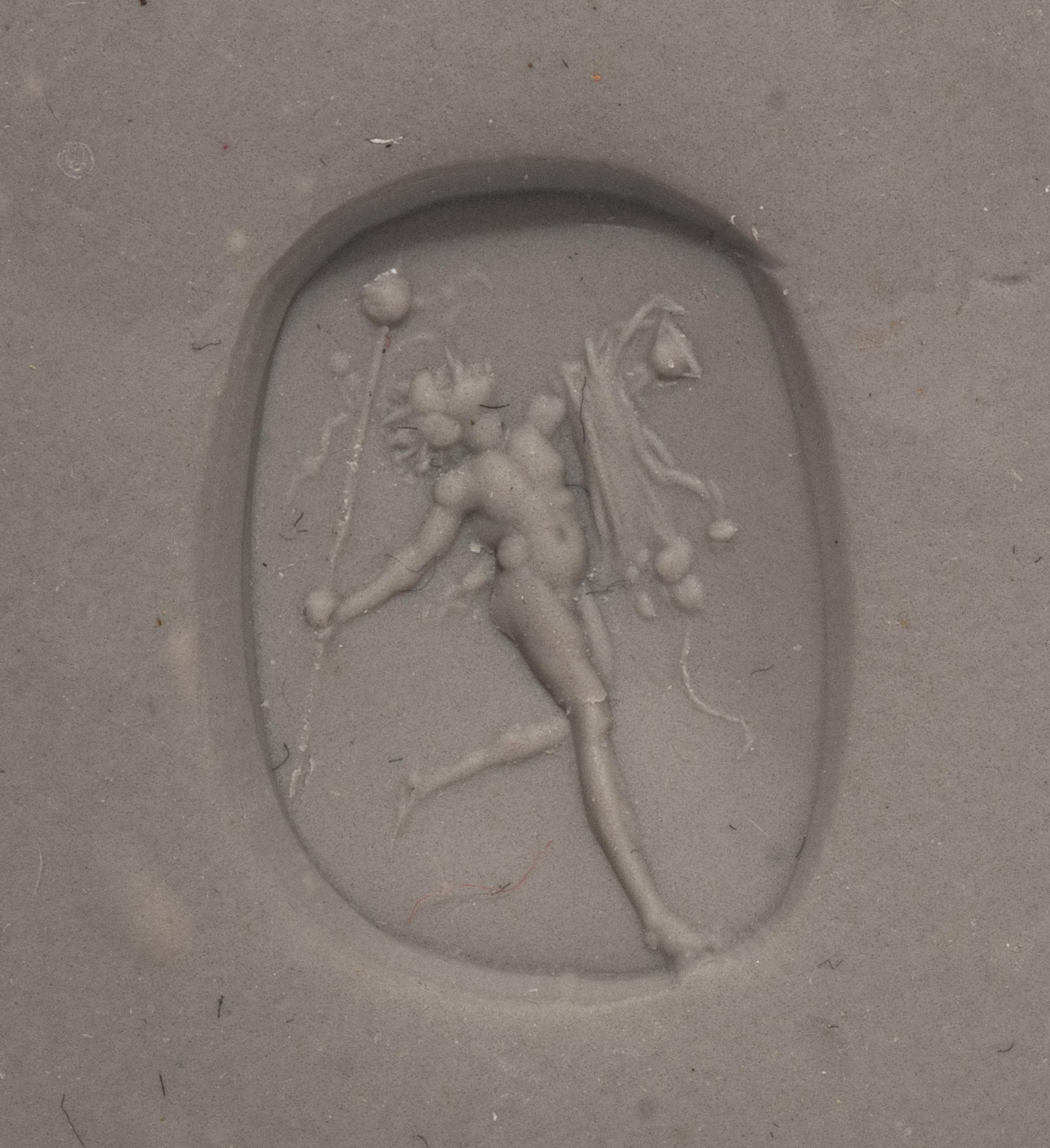 A Roman Carnelian Intaglio with a Dancing Satyr