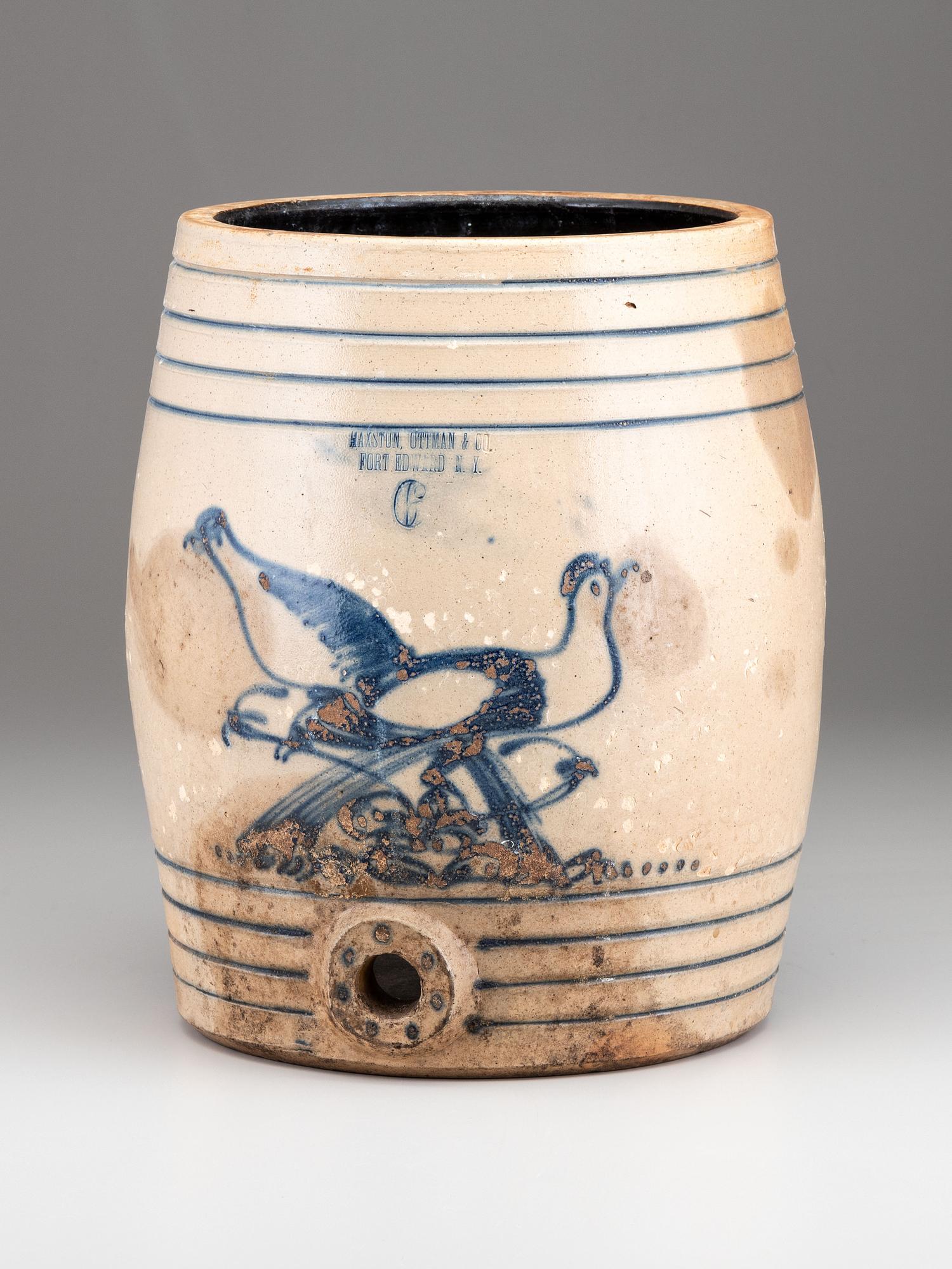 A Maxstun, Ottman & Co. Cobalt Decorated Six-Gallon Stoneware Cooler