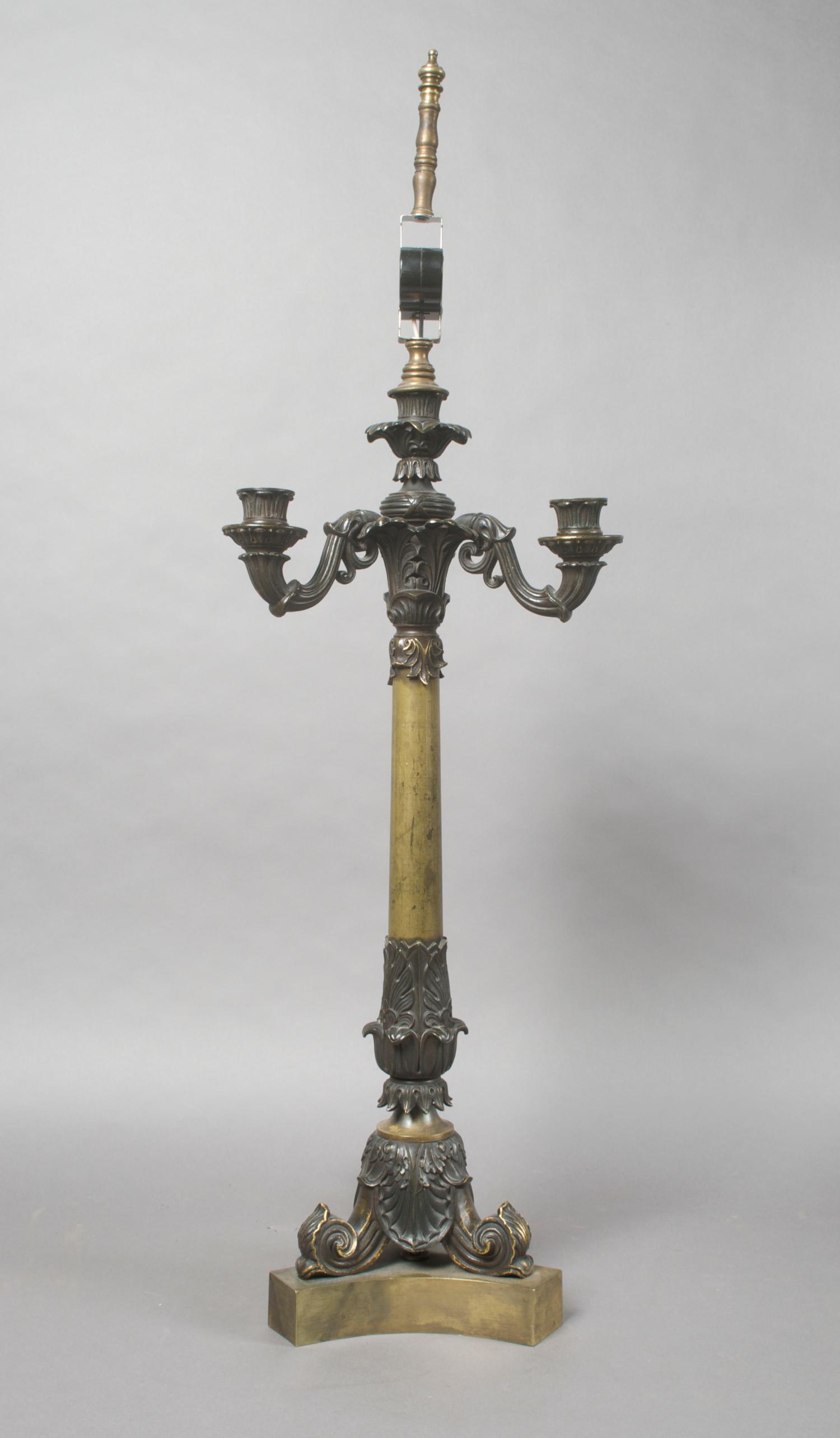 A Neoclassical Bronze Four-Light Candelabra, Height overall 33 inches.