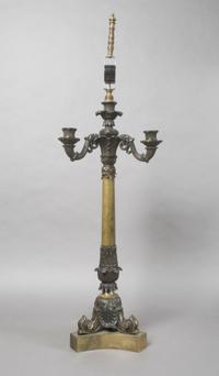 A Neoclassical Bronze Four-Light Candelabra, Height overall 33 inches.