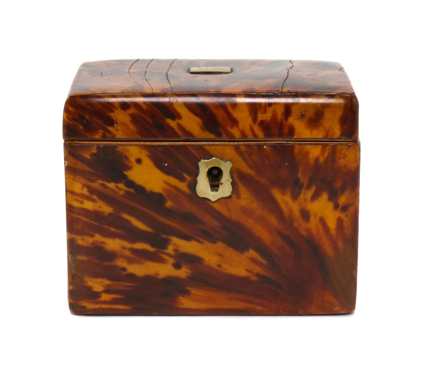 An English Tortoise Shell Veneered Tea Caddy, Height 3 3/4 x width 4 3/4 x depth 3 3/8 inches.