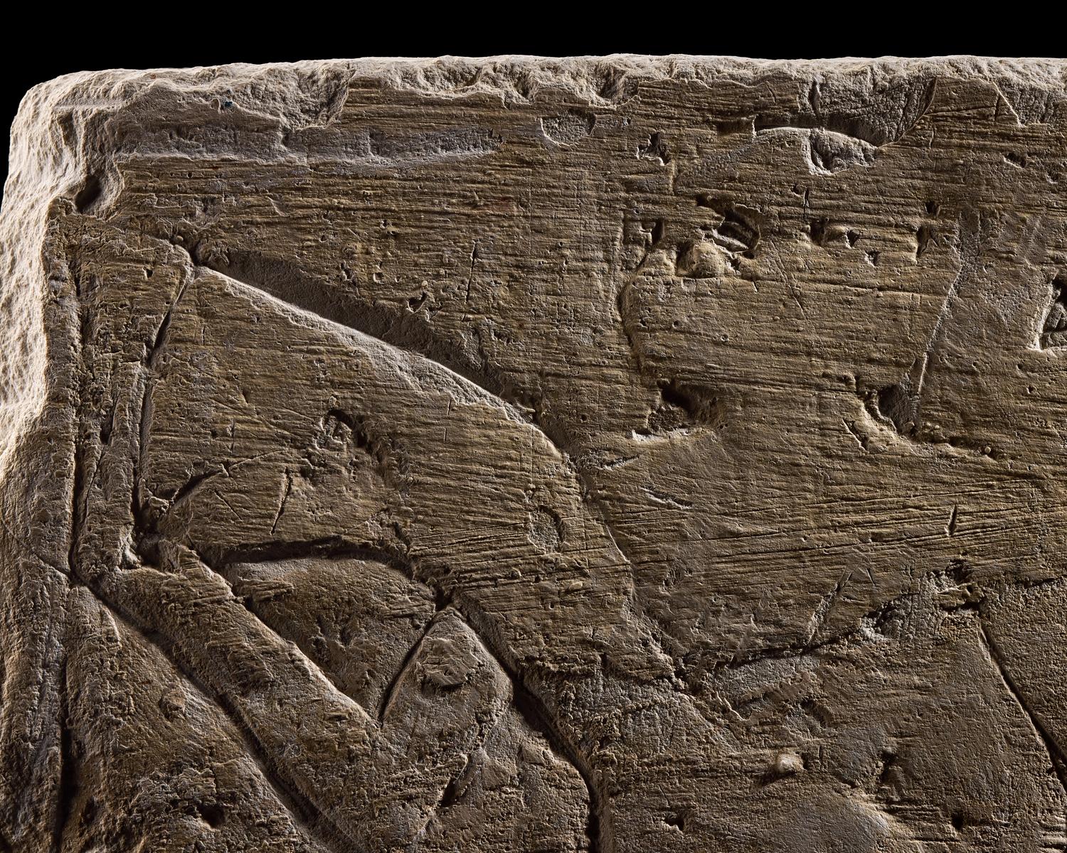 An Egyptian Limestone Relief Fragment Depicting an Offering Scene
