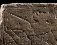 An Egyptian Limestone Relief Fragment Depicting an Offering Scene