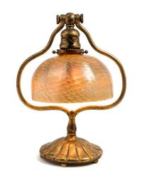 Tiffany Studios, EARLY 20TH CENTURY, a gilt bronze and Favrile glass desk lamp