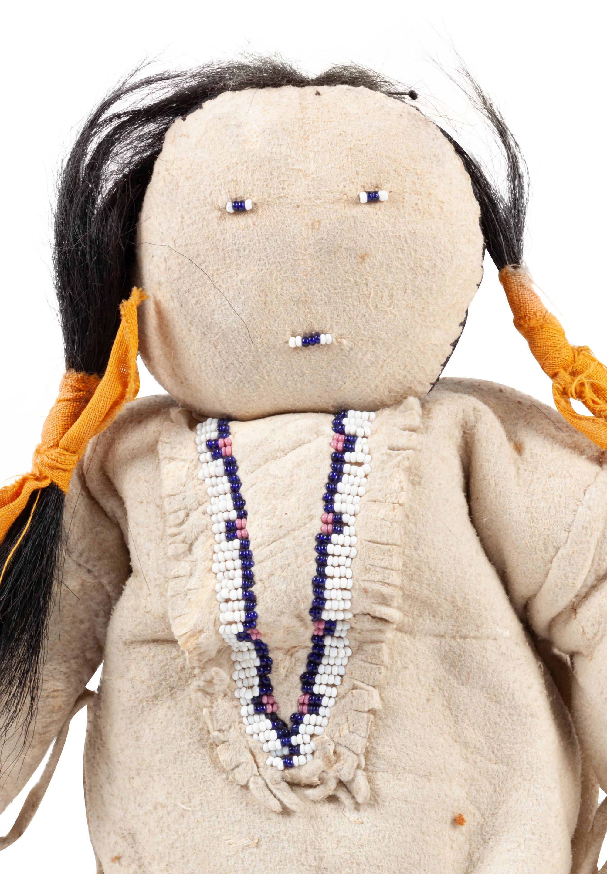 Apache and Plains Beaded Hide Dolls