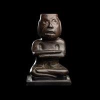 A Group of Twelve Pre-Colombian Style and Near Eastern Style Carved Stone Articles