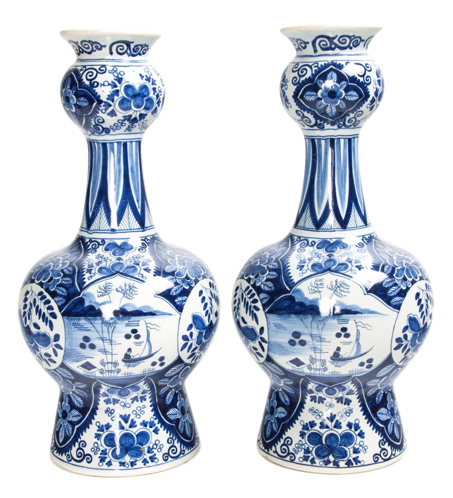 A Pair of Delft Blue and White Bottle-Neck Vases Height 15 3/4 inches. — 20TH CENTURY