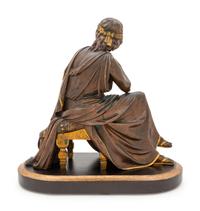 A Continental Gilt and Patinated Bronze Figure
