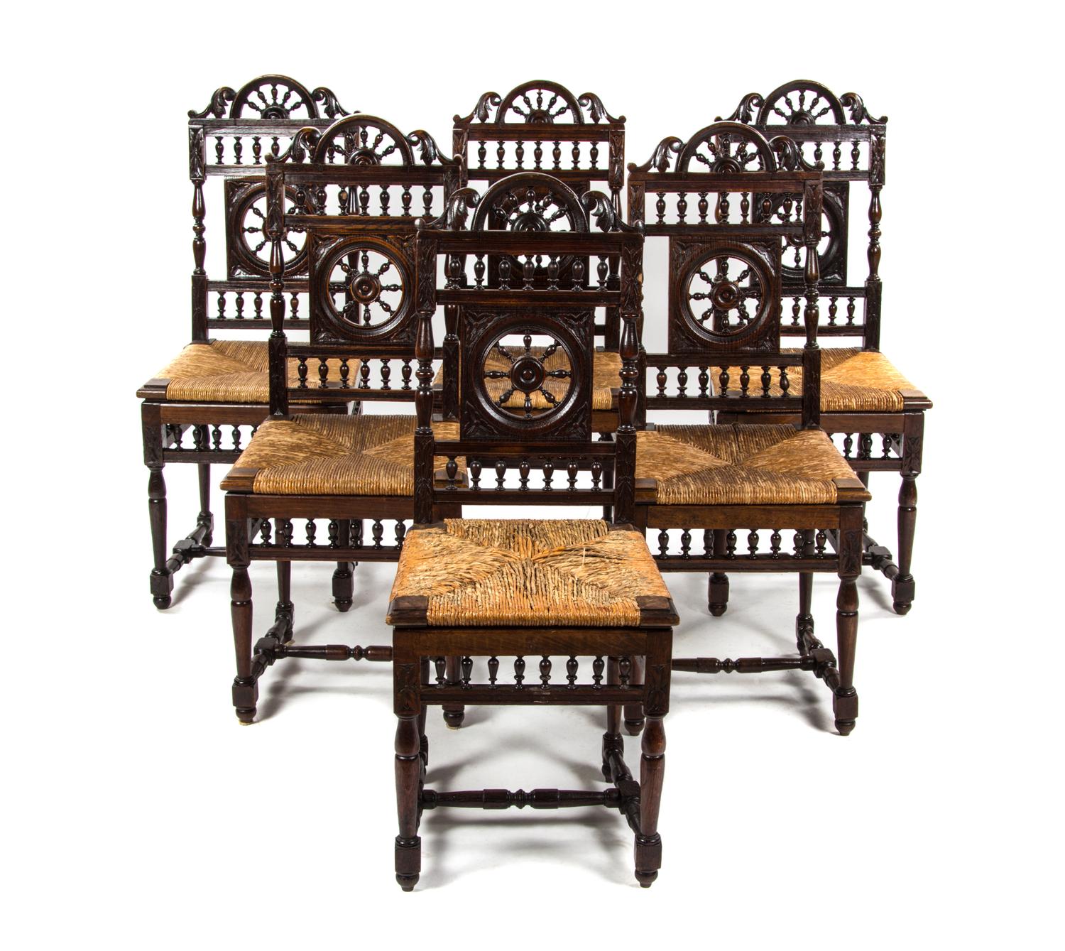 A Set of Six Brittany Oak Side Chairs, Height 40 1/4 inches.